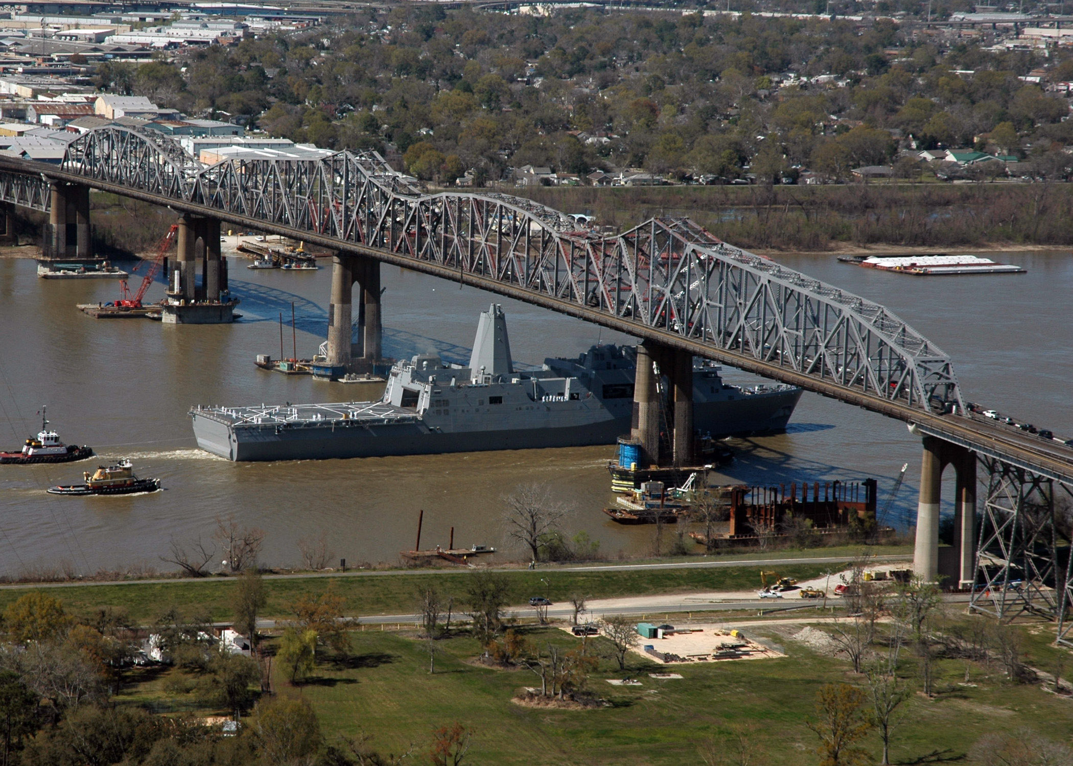 USS New Orleans under Huey P Long Bridge