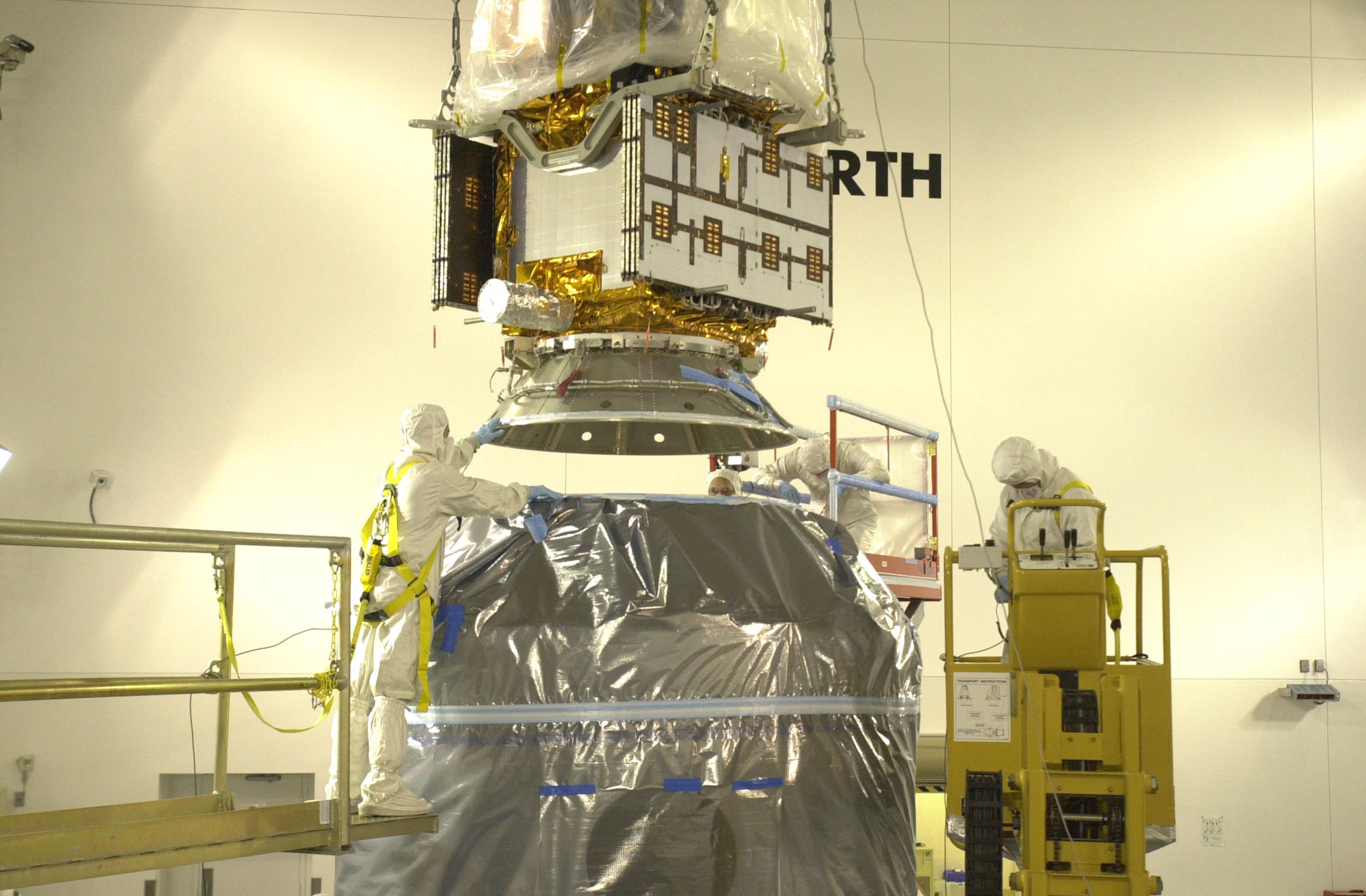 CALYPSO is lowered to the dual-payload attach fitting