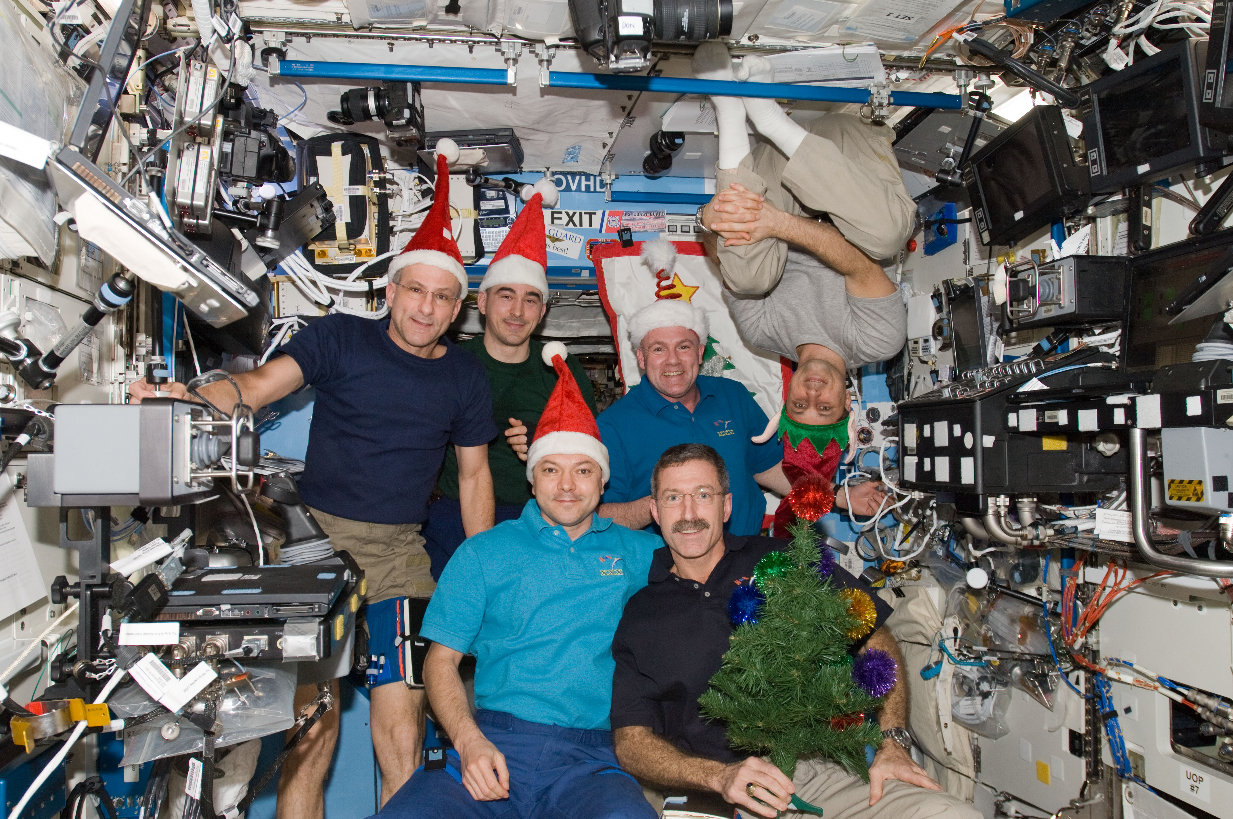 Expedition 30 crew with Santa Claus hats