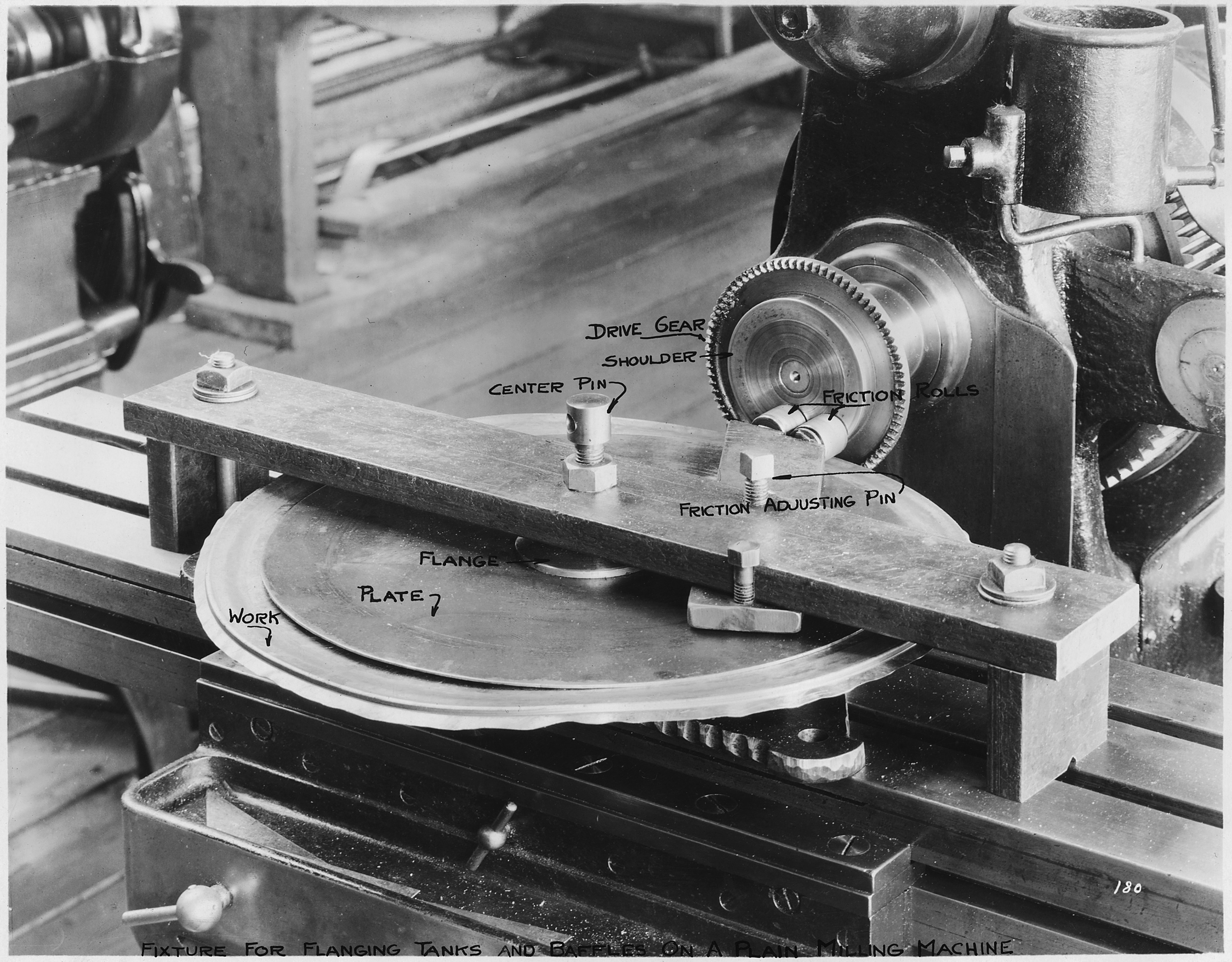 Fixture for flanging tanks and baffles on a plain milling machine. - NARA - 298559