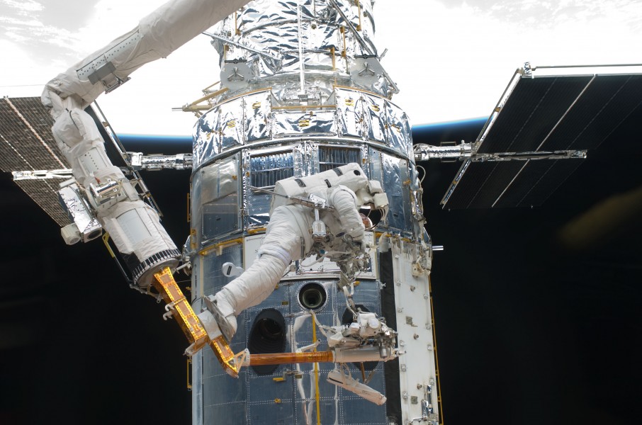 Andrew Feustel performs work on the Hubble Space Telescope