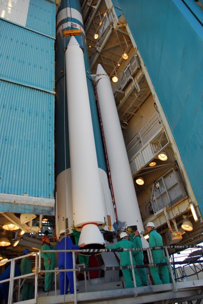 Attachment of one of three solid rocket booster to Aquarius SAC-D Delta II 7320-10C rocket