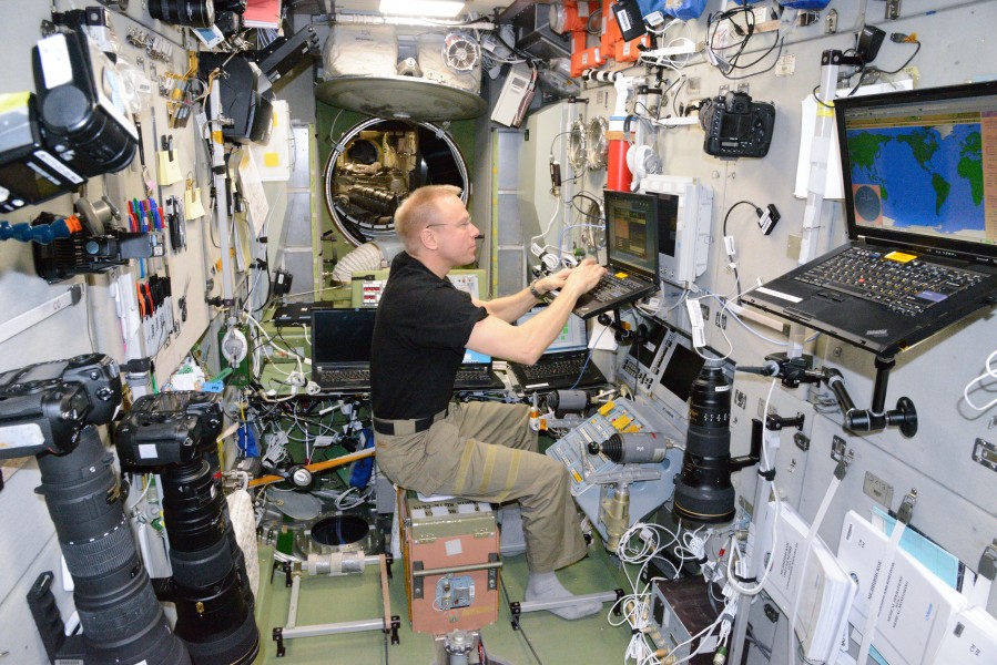 ISS-47 Tim Kopra on a Laptop in the Zvezda Service Module