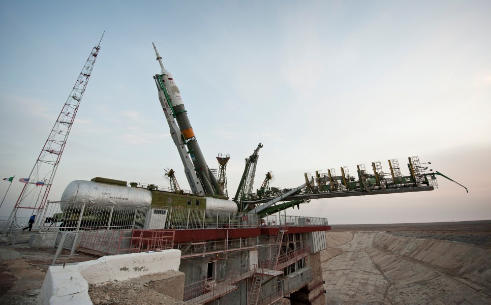 Soyuz TMA-20 spacecraft is raised into vertical position