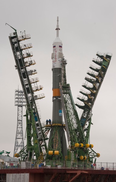 Soyuz TMA-21 spacecraft is lifted into position on the launch pad