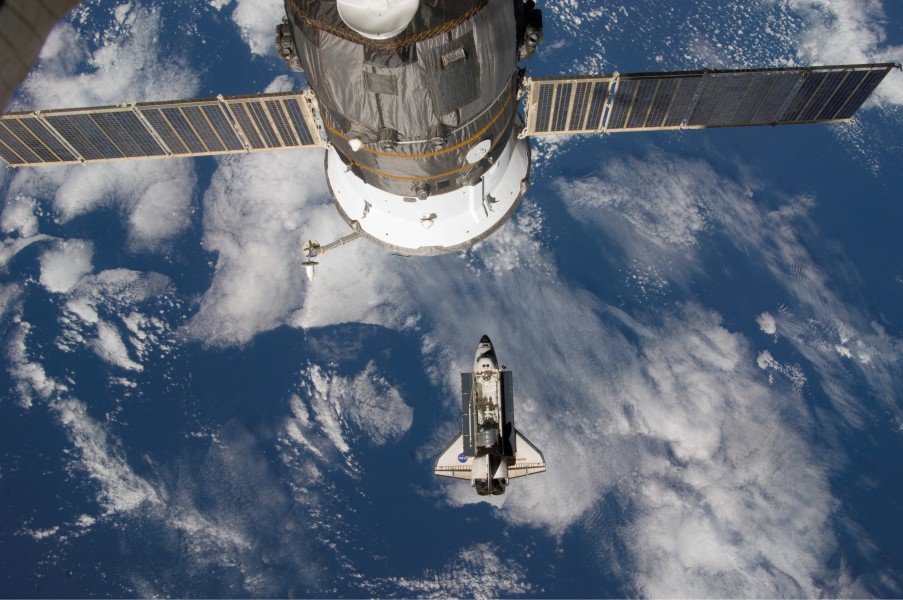 STS-123 rendezvous and docking with ISS, Progress M63 visible