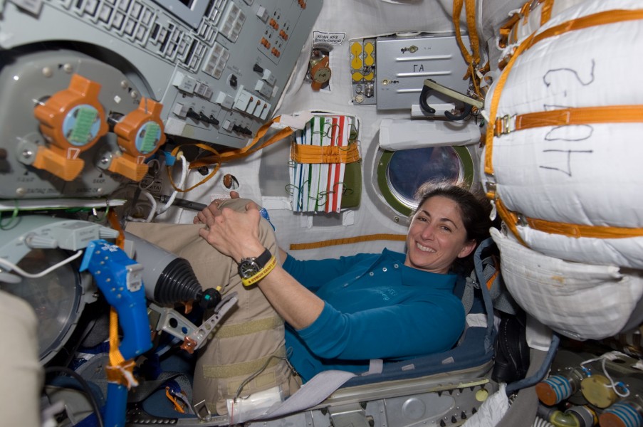 STS-133 Nicole Stott in a Soyuz spacecraft