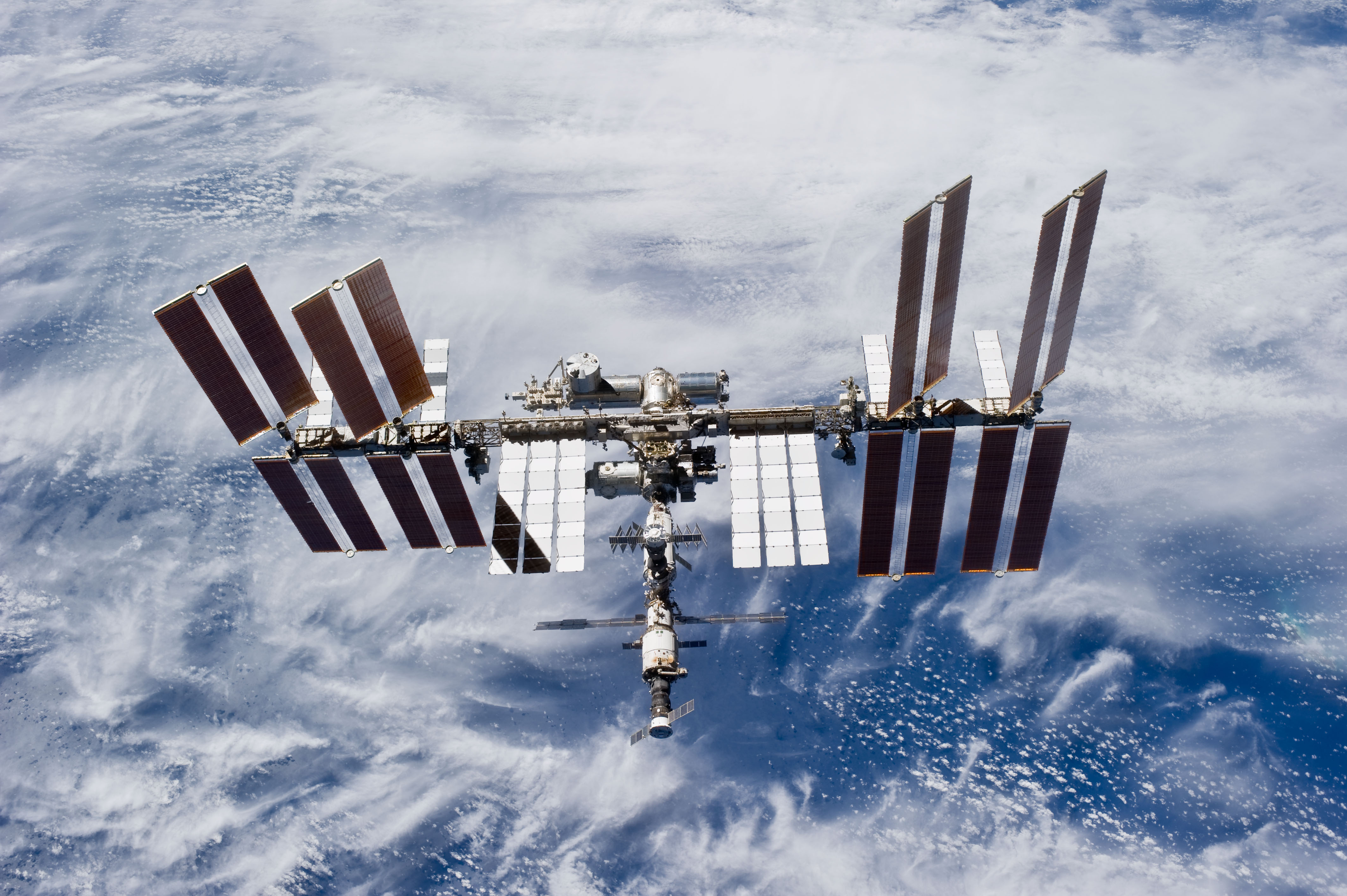 STS-131 Discovery flies around 4