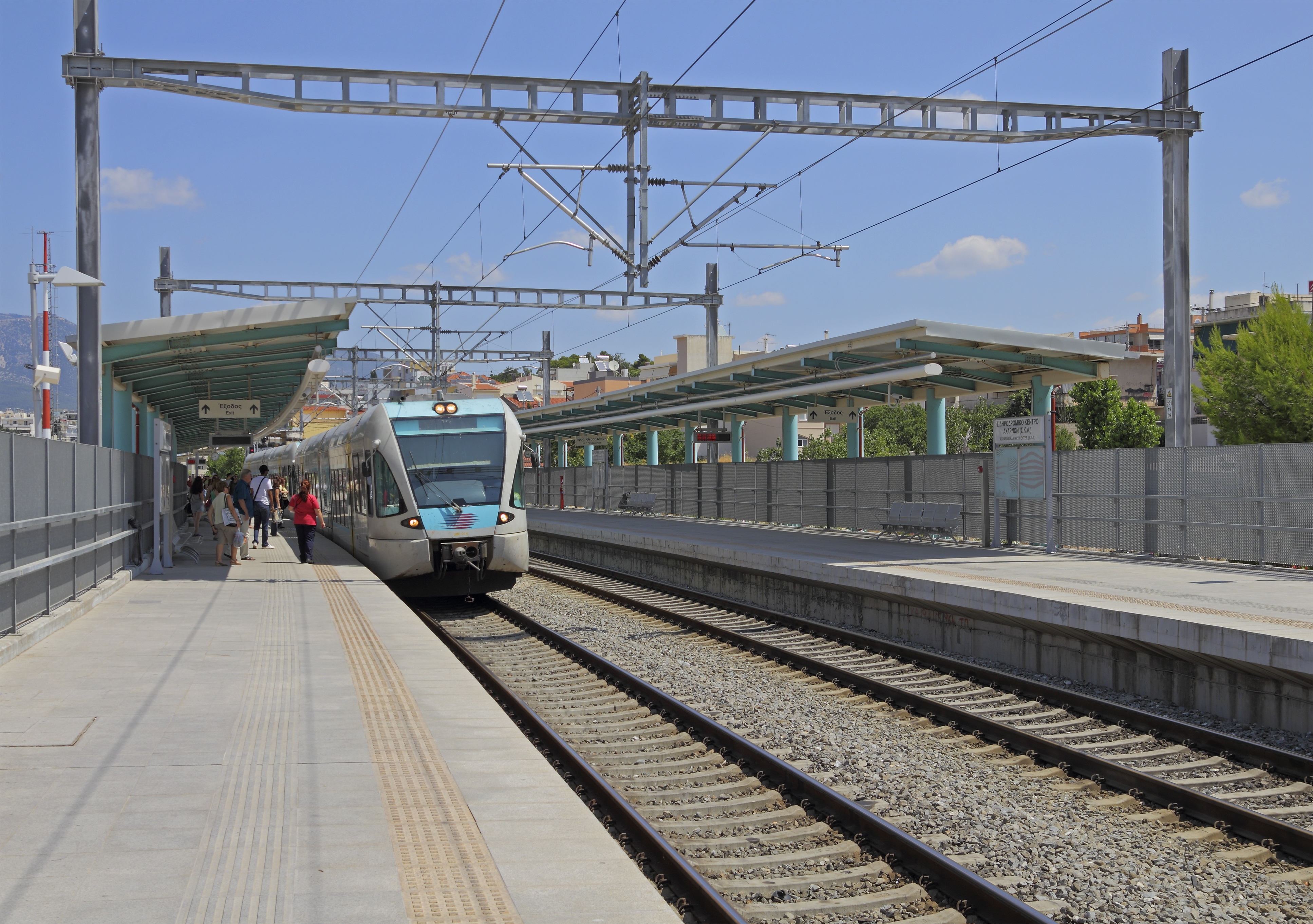 Attica 06-13 SKA train stop 03 Proastiakos train arriving