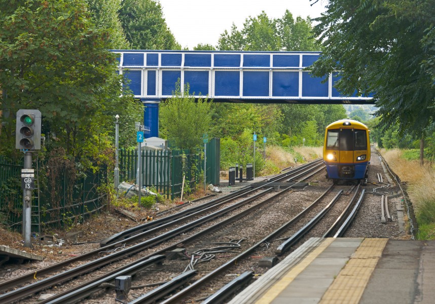London Overground train approaching Kew Gardens station from south